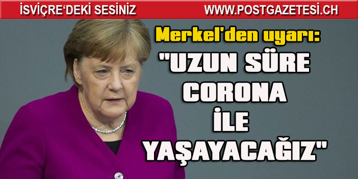 Merkel'den 'Kovid-19 salgınıyla uzun süre yaşamak zorunda kalacağız' uyarısı