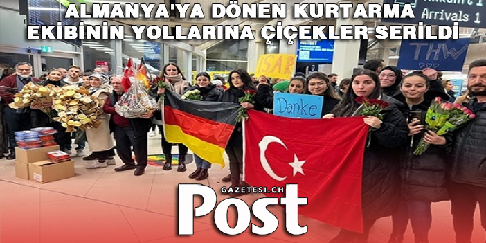 Almanya'ya dönen kurtarma ekibinin yollarına çiçekler serildi